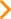 White arrow pointing downward inside a black rounded square.